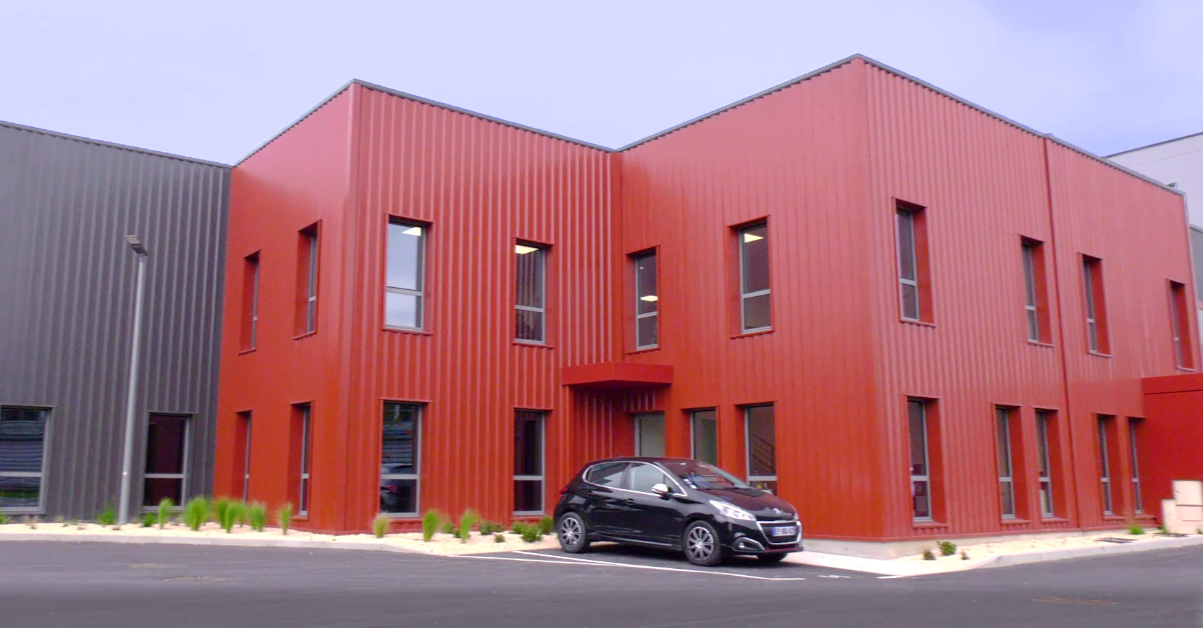 View of the outside of the Ergoflix France head office in building B at Mi-Park business park at number 6 rue d’Arsonval in Chassieu (Mi-Plaine industrial estate, Lyon Métropole)